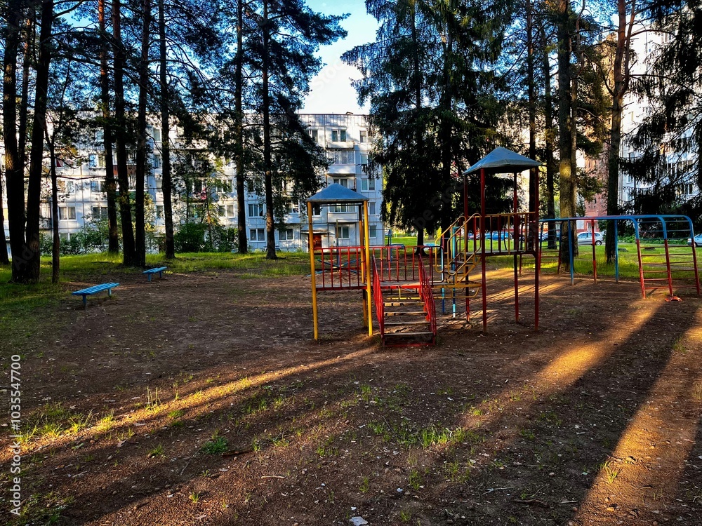 A colorful playground in the courtyard in the park. A colorful playground in the courtyard in the park.