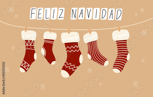Hanging Christmas stockings on rope with cute xmas patterns. Feliz Navidad Hanging Christmas Stockings on rope.