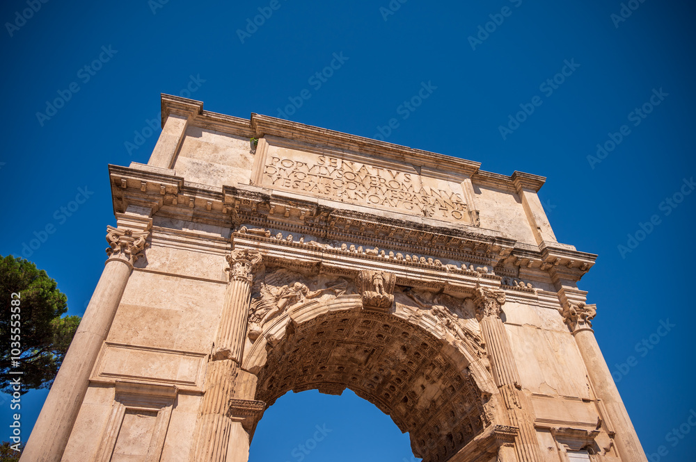 Triumphal Arch of Titus on the via Sacra in Rome. Triumphal Arch of Titus on the via Sacra in Rome.