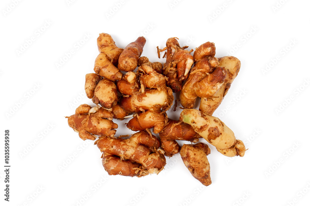 top view traditional Aromatic Ginger, Sand Ginger isolated on white backround. Herbs and spices. Tropical plant primarily used in Indonesian cuisine and traditional medicine , knobby ginger roots wit top view traditional Aromatic Ginger, Sand Ginger isolated on white backround. Herbs and spices. Tropical plant primarily used in Indonesian cuisine and traditional medicine , knobby ginger roots wit