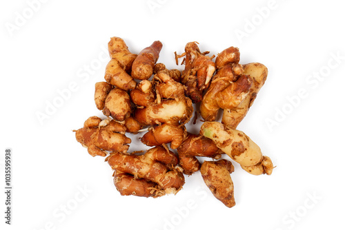 top view traditional Aromatic Ginger, Sand Ginger isolated on white backround. Herbs and spices. Tropical plant primarily used in Indonesian cuisine and traditional medicine , knobby ginger roots wit