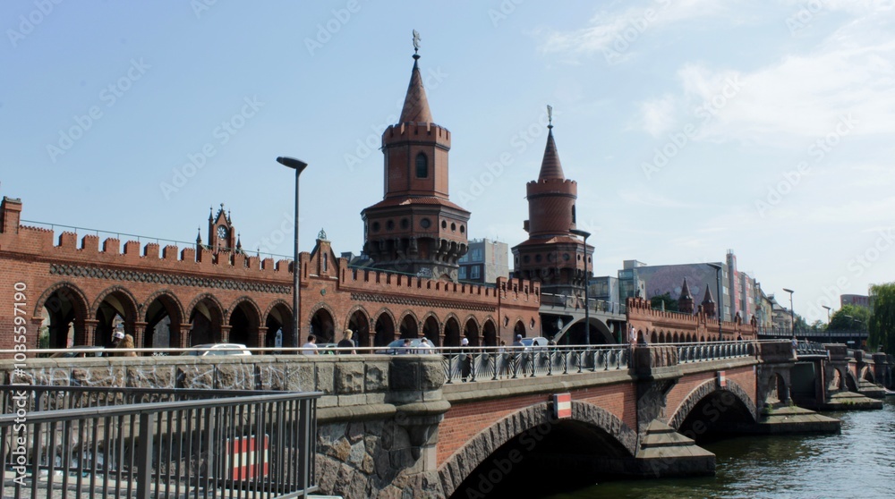 The Oberbaum Bridge is a double-deck bridge crossing Berlin's River Spree, considered one of the city's landmarks. Taken in Berlin, Germany The Oberbaum Bridge is a double-deck bridge crossing Berlin's River Spree, considered one of the city's landmarks. Taken in Berlin, Germany