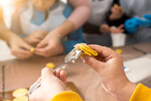 Wallpaper Mural Kids’ cooking workshop featuring dumpling and ravioli making. Close-up of dough preparation and shaping, capturing the joyful learning process and teamwork in a fun and interactive environment Torontodigital.ca
