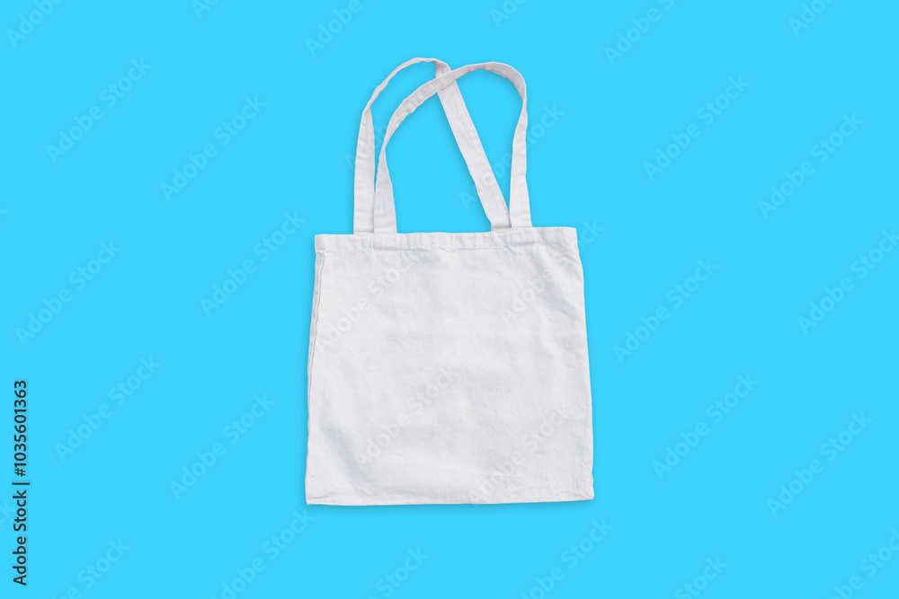White cotton, canvas, tote, mesh bag on red orange background. Zero waste, no plastic, eco friendly, recycling concept. Blank mockup shopper with place for artwork or text. Flat lay, copy space White cotton, canvas, tote, mesh bag on red orange background. Zero waste, no plastic, eco friendly, recycling concept. Blank mockup shopper with place for artwork or text. Flat lay, copy space