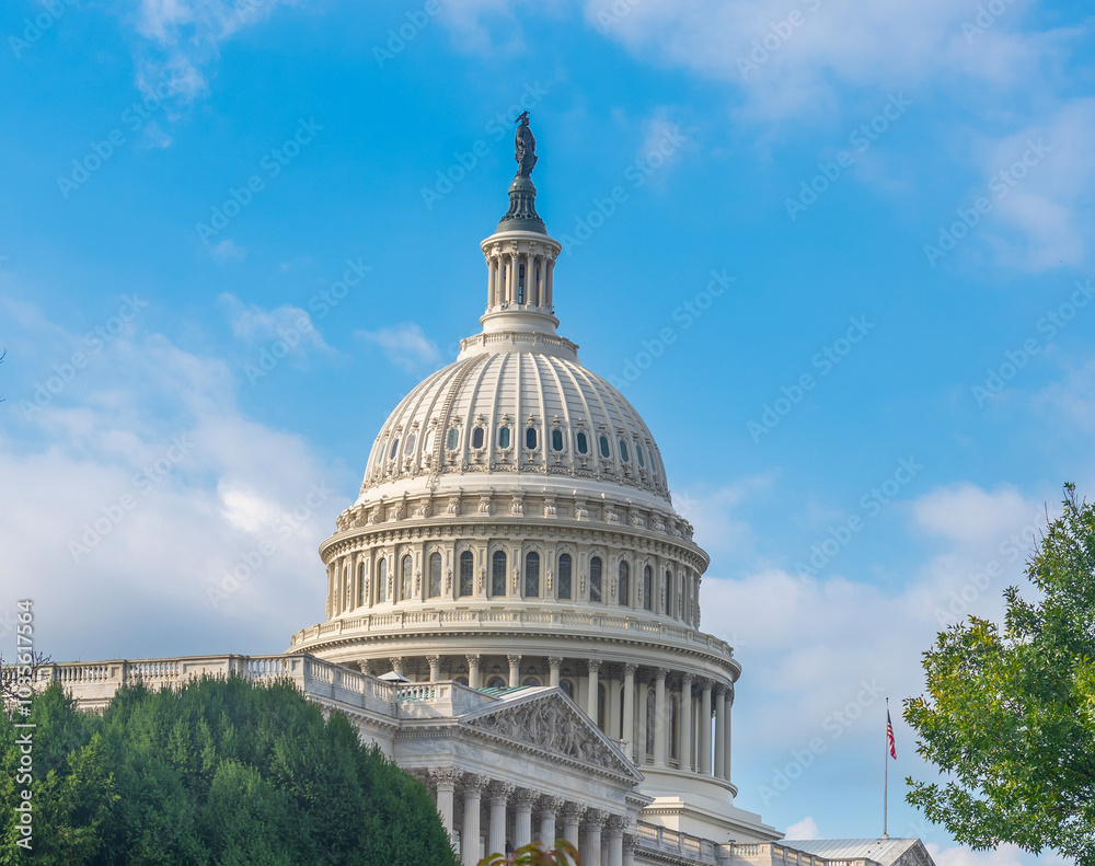 Blue sky with clouds over United States Capitol dome