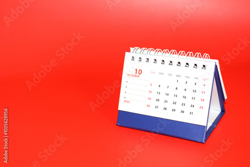 Monthly calendar template for the new year 2025 desk calendar,on red background