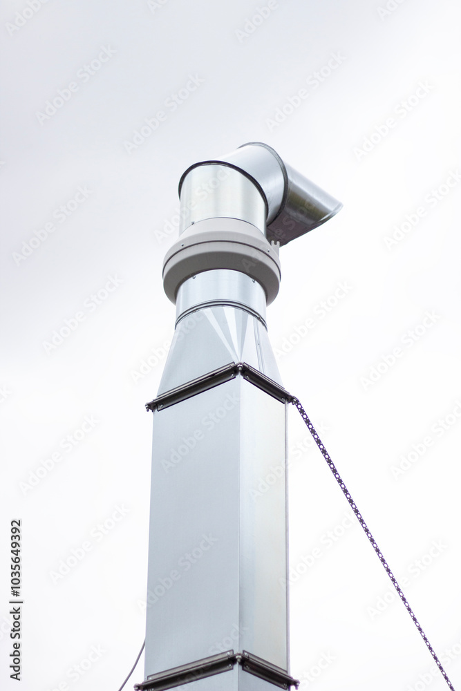 Vertical shot of Pipe for air purification in production Ventilation in restaurant kitchens