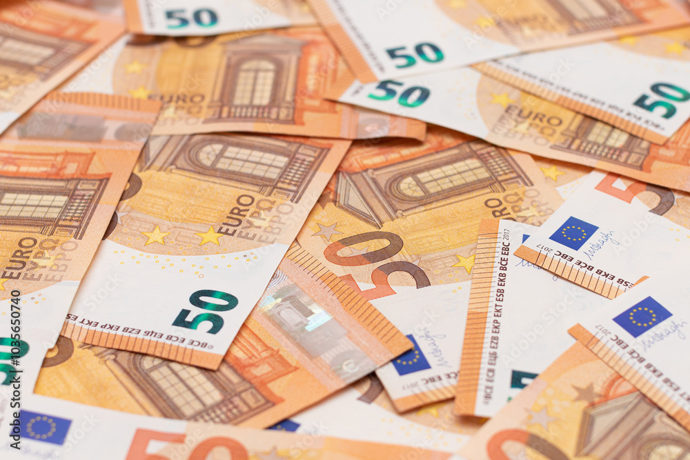 50 Euro Banknotes Money Background. Euro Money Currency. Orange Paper Money. A Lot of Fifty Euro Bills. Business, Finances, Cash and Money Saving Concept 50 Euro Banknotes Money Background. Euro Money Currency. Orange Paper Money. A Lot of Fifty Euro Bills. Business, Finances, Cash and Money Saving Concept