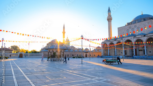 Life continues in Konya city center while the sun has just risen. View of the city's landmarks and Mevlana tomb photo