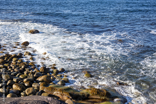 waves on the rock beach