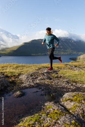 Trail runner running in the golden hour