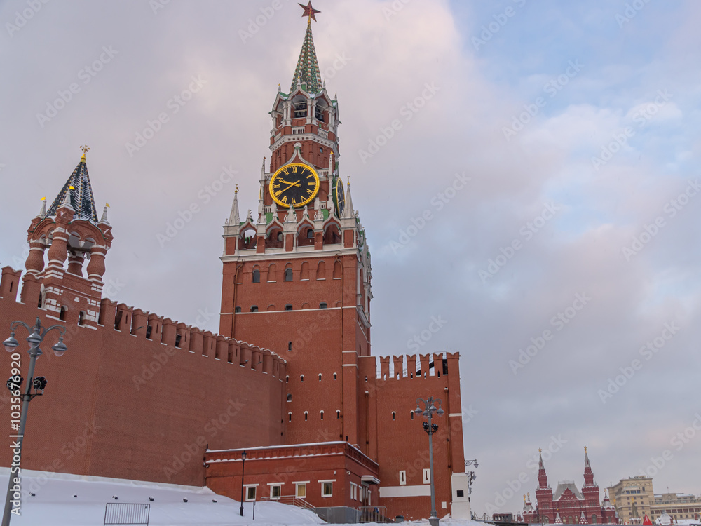 The Spasskaya Tower of the Moscow Kremlin, overlooking the Red Square. The gate to the Moscow Kremlin. The defensive wall surrounding the Kremlin. The chimes on the Spasskaya Tower. The Spasskaya Tower of the Moscow Kremlin, overlooking the Red Square. The gate to the Moscow Kremlin. The defensive wall surrounding the Kremlin. The chimes on the Spasskaya Tower.