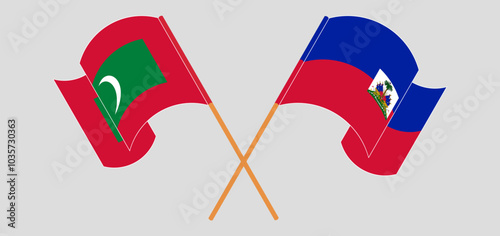 Crossed and waving flags of Maldives and Republic of Haiti. Vector illustration