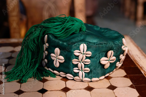 Traditional gnawa hat. The Gnawa or Gnaoua, Ghanawa, Ghanawi, Gnawi, are an ethnic group inhabiting Morocco. photo