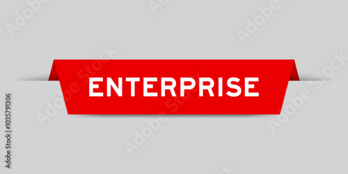 Red color inserted label with word enterprise on gray background
