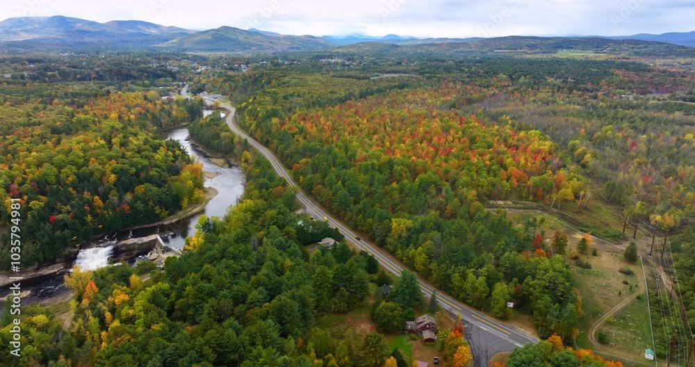 Breath-taking scenery of North New York State, USA. The Ausable River crosses the woods changing colors in autumn. Top view.