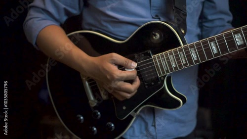 Close-Up Cinematic Musician playing guitar in the concert