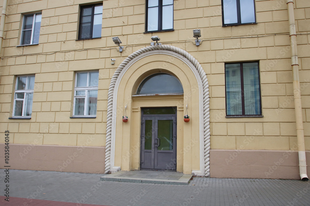The entrance to a building featuring a decorative rope archway The entrance to a building featuring a decorative rope archway