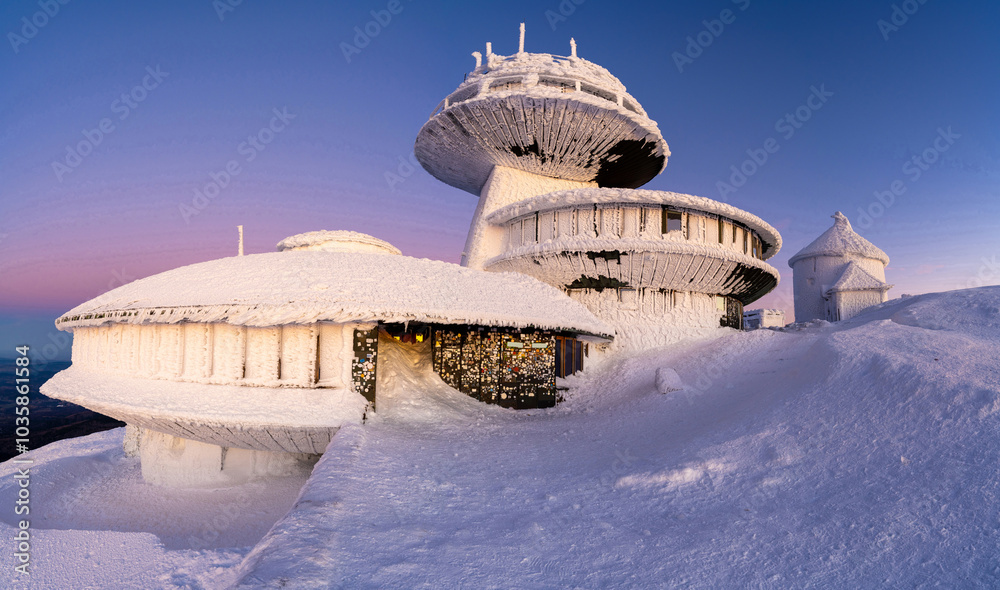 architecture on Sniezka peak during winter dusk in Karkonosze mountains in Poland