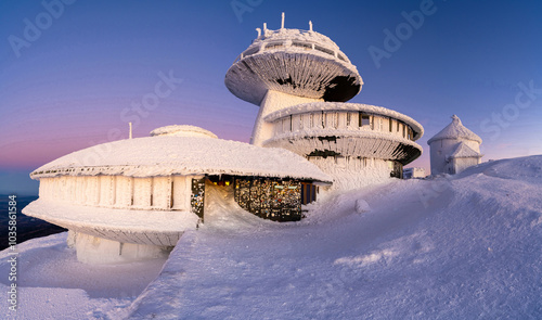 Obraz na płótnie architecture on Sniezka peak during winter dusk in Karkonosze mountains in Poland w salonie