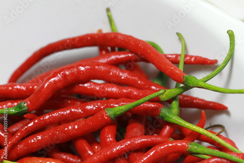 Fototapeta Naklejka Na Ścianę i Meble -  a bunch of red and green chilies