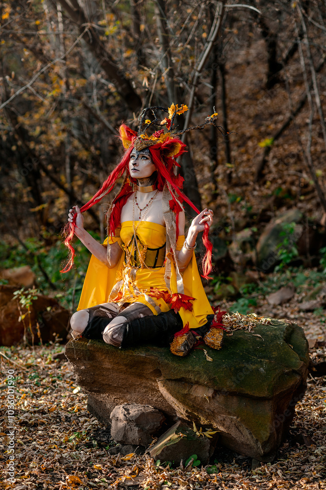 Deer girl in the autumn forest Deer girl in the autumn forest