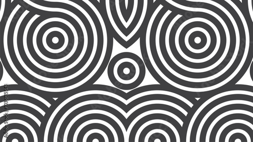 Each spiral is outlined in bold black lines, contrasting sharply against a crisp white background. The overall effect is both hypnotic and mesmerising, drawing the eye into the intricate details.