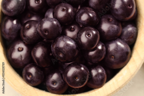 Wallpaper Mural Ripe acai berries in wooden bowl, top view Torontodigital.ca