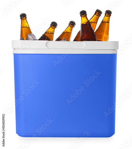 Many bottles of drinks in cooler box isolated on white photo