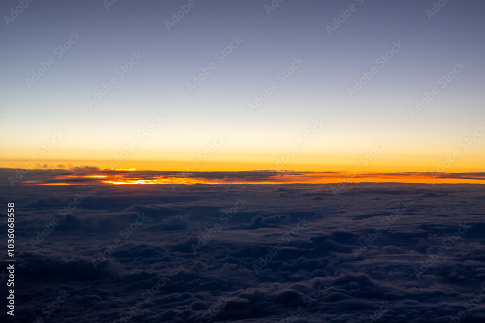 Clouds from above after sunset from an airplane Clouds from above after sunset from an airplane