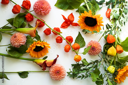 colorful autumn bouquet, top view. sunflower, eucalyptus and phaselis on a white background photo