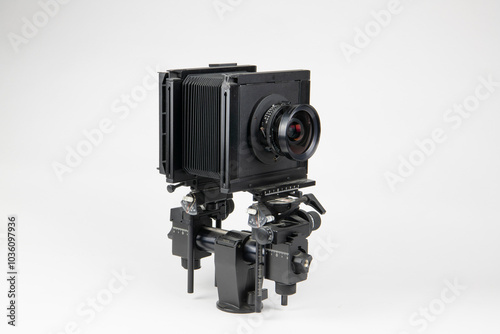 Vintage Large Format Camera with Adjustable Bellows and Tripod Mount Isolated on White Background