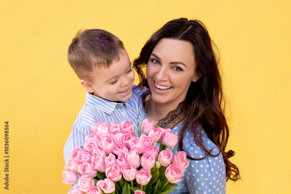 Beautiful mommy plays with cute little son. Happy mother spending time with laughing little child Beautiful mommy plays with cute little son. Happy mother spending time with laughing little child