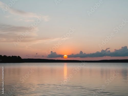 Serene Sunset Over Calm Lake Reflections.