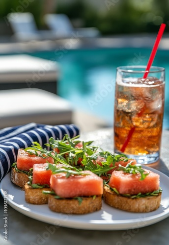 Refreshing summer snack of watermelon toast beside a sparkling pool in bright...