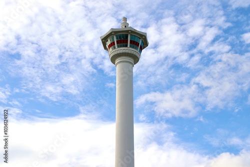 Low Angle View of Busan Tower Against Cloudy Blue Sky with Ample Copy Space. Minimalistic Shot