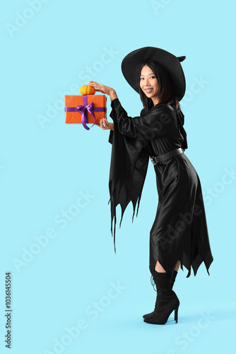 Young Asian woman dressed a...