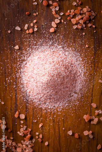 Fotografie Himalayan Pink Salt on Rustic Wooden Table Surface
