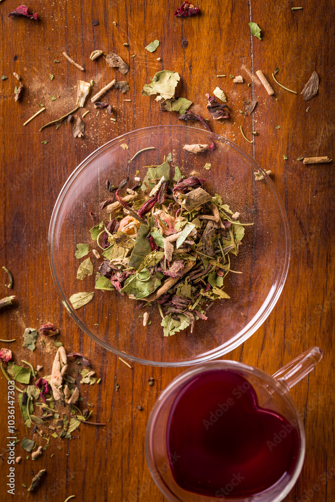 Aromatic Herbal Tea Preparation on Wooden Table Aromatic Herbal Tea Preparation on Wooden Table