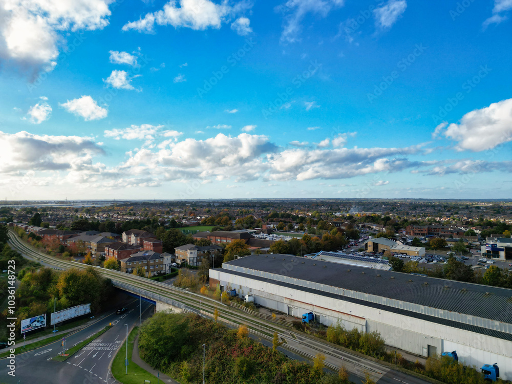 Fototapeta premium High Angle Footage of North Luton City of England UK. Aerial Footage Was Captured with Drone's Camera on October 17th, 2024 at Just Before Sunset Time.