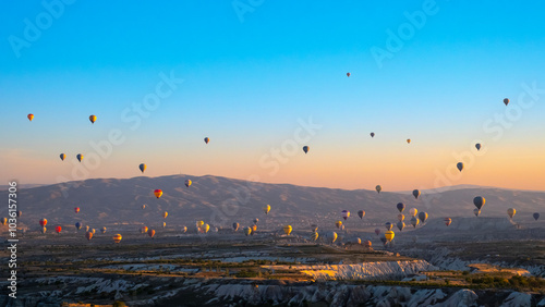 Fototapeta Naklejka Na Ścianę i Meble -  Hot air balloons fly in Cappadocia on an autumn morning.