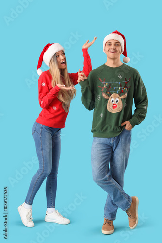 Happy young couple in festi...