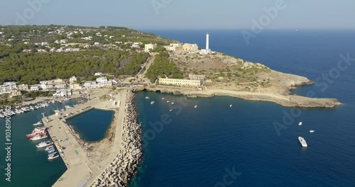 Aerial view of the Basilica Sanctuary of Santa Maria de Finibus Terrae and the Leuca lighthouse on the top of Punta Meliso. They are located in Santa Maria di Leuca in Salento, Puglia, Italy. photo