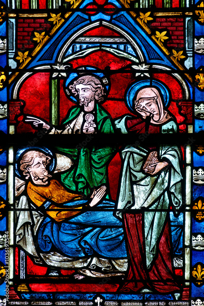 2024-10-16, Auxerre, FRANCE. Stained glass (17th century) of Death of Saint Joseph surrounded by Mary and Jesus.