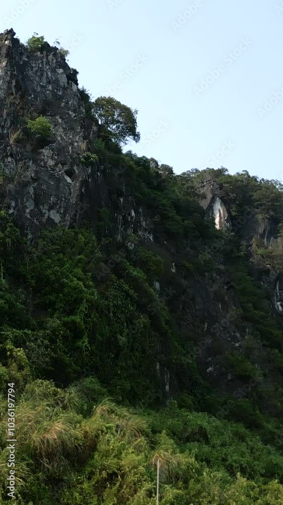 drone surrounding the rocky mountains in the middle of nature in Vietnam drone surrounding the rocky mountains in the middle of nature in Vietnam