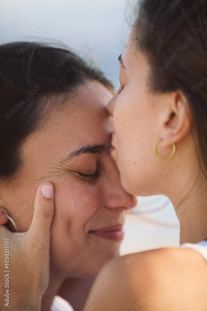 Intimate moment between two lesbian women on Playa de Nerga, Spain Intimate moment between two lesbian women on Playa de Nerga, Spain