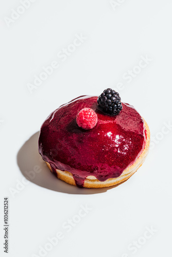 Cheesecake-Filled Donut with Berry Glaze and Fresh Fruit Topping photo