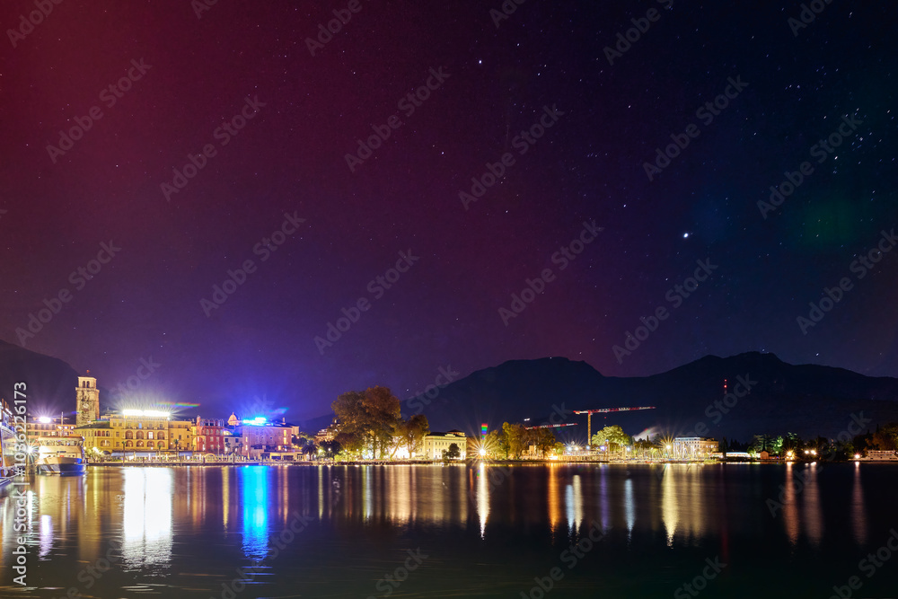 Geomagnetic storm Aurora Borealis and red SAR in Riva del Garda, Lake Garda in October 2024, Italy Geomagnetic storm Aurora Borealis and red SAR in Riva del Garda, Lake Garda in October 2024, Italy
