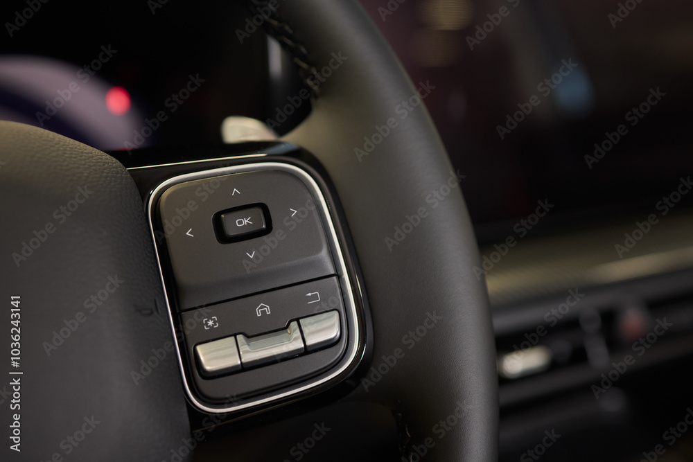 The modern cars steering wheel control panel boosts convenience and performance The modern cars steering wheel control panel boosts convenience and performance