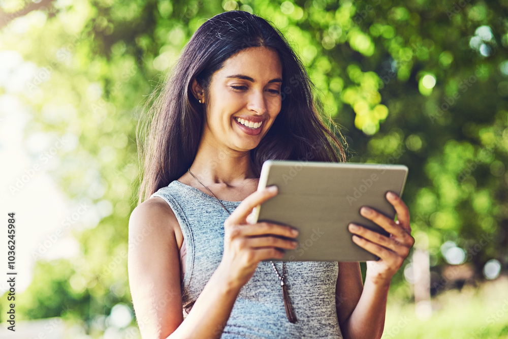 Happy woman, research and nature with tablet for eco friendly or paperless environment. Young, female person or user with smile on technology for online newspaper, article or app at outdoor park Happy woman, research and nature with tablet for eco friendly or paperless environment. Young, female person or user with smile on technology for online newspaper, article or app at outdoor park